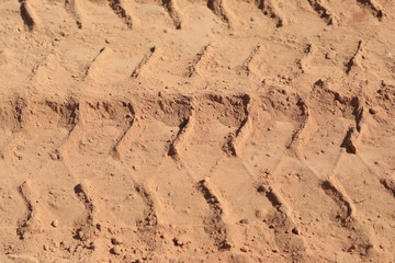 Close up the Dirt Road Texture with Tire Marks