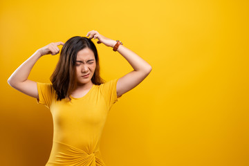 Woman scratching her head