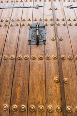 Detail of the knocker on the door of the bishopric in the old town of Caceres.