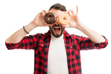 Man Covering Eyes With Donuts