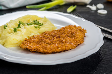 Chicken steak or schnitzel with mashed potatoes