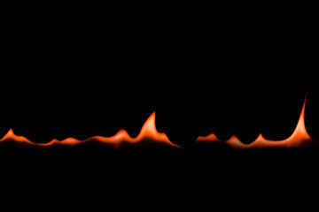 Fire flames on Abstract art black background, Burning red hot sparks rise, Fiery orange glowing flying particles