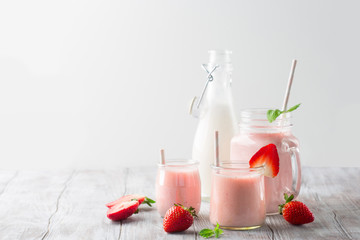 Detox diet concept: strawberry smoothie on table