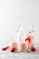 Detox diet concept: strawberry smoothie on table