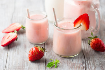 Detox diet concept: strawberry smoothie on table