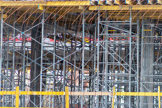 Construction formwork for casting of monolithic concrete structures and scaffolding
