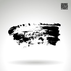 Black brush stroke and texture. Grunge vector abstract hand - painted element. Underline and border design.