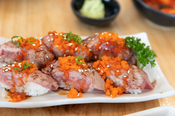Japanese sushi food,close up of sashimi sushi set on a table in a restaurant