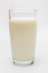 glass of milk on a white background