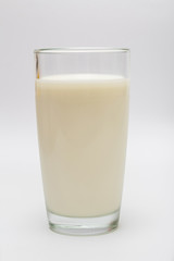 glass of milk on a white background