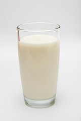 glass of milk on a white background