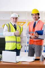 Two engineers colleagues working under project 