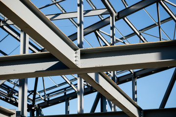 Steel frame of new building in construction - girder joint detail - shallow depth of field