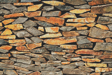 Old sunburnt brick wall built without 