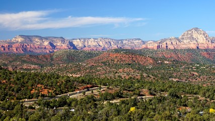 Landscape Vista of Sedona, Arizona with Cliffs and Mesas and Lots of Sky and Bright Sunshine