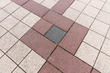 Square cobblestones on the footpath. Pattern, texture or background