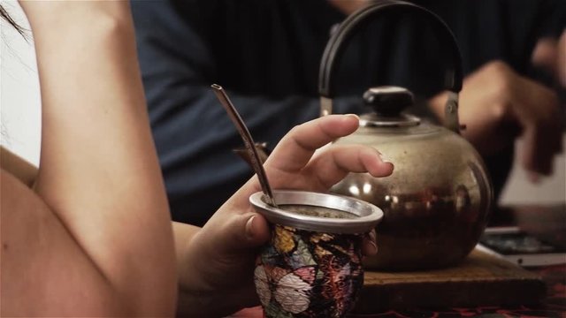 Argentinian Family Drinking Mate At Breakfast. Slow Motion Shot. 