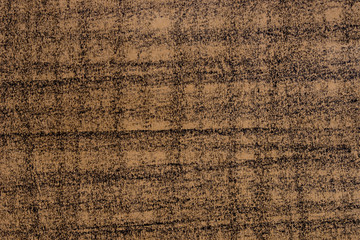 black crayon lines onbrown paper background texture