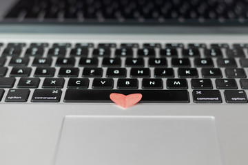 Heart on the keyboard, dating online concept 