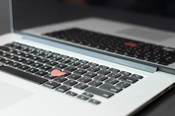 Heart on the keyboard, dating online concept 