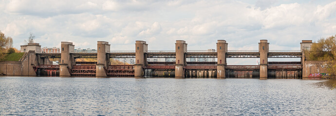 Dam blocking the river and raising the water level for navigation