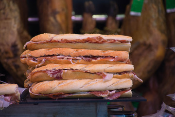  Many sandwiches of ham and cheese prepared to be served, this sandwich is very typical of Spain