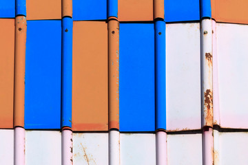 texture. color metal tile. it is made of metal. it has scratches and rust