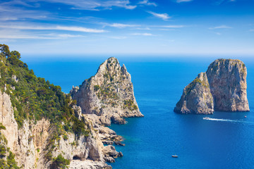 Daylight view of famous Faraglioni Rocks, Capri Island, Italy