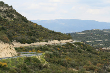 Fototapeta na wymiar Empty mountain road with a view