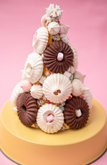 Cone made by white and brown meringues