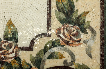 Fototapeta na wymiar Detail of a beautiful marble mosaic panel. Interior marble mosaic. A piece of marble Venetian mosaic as a decorative background .. Selective focus