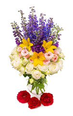 Bouquet of beautiful flowers roses, lilies and delphinium elatum in vase isolated on white background. Floral pattern composition. Flat lay, top view. Still life