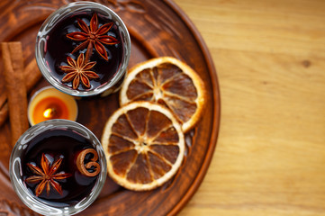 star anise and cinnamon sticks on wooden background