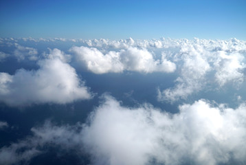 Naklejka na ściany i meble aerial view of cloud background from airplane