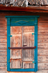 Closeup of the old window in slums of Astrakhan, Russia.