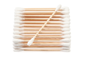 Eco-friendly materials. Wooden, cotton swabs on a white background