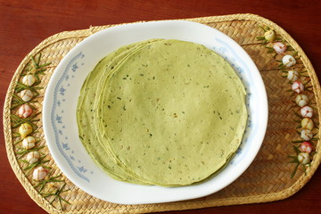 indian traditional food lunch or tea time snack papad or papadum  raw dried