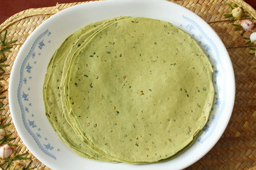 indian traditional food lunch or tea time snack papad or papadum  raw dried