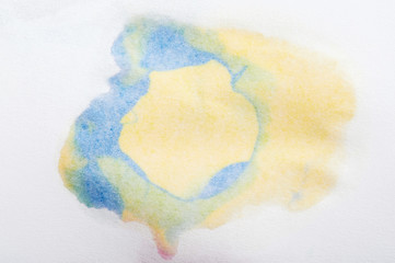 Blue and yellow abstract paint splash