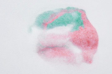 Red and green paint stain