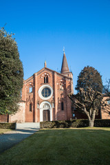Abbey of Viboldone, in the province of Milan, with the historic main door and columns
