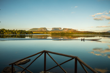 Obraz premium Sunrise over three small mountain in Ucaima. Canaima National Park, Venezuela.