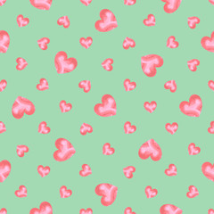 Seamless pattern of pink watercolor hearts of different size, on a mint background.