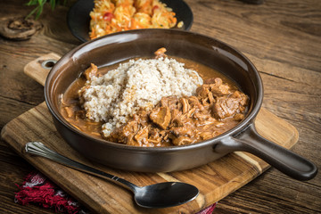 Barley groats with stewed meat.