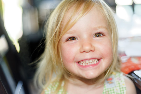 A beautiful smiling young girl (3 yrs old)