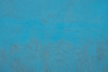 Turquoise cracked wall texture background 