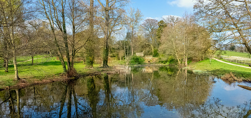 Fototapeta na wymiar View of Octagon Lake and surrounding area in Stowe, Buckinghamshire, United Kingdom