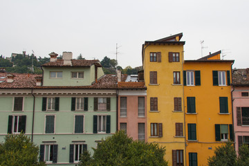 Narrow colorful building in Brescia, Lombardy, Italy.