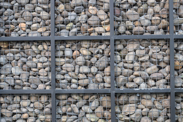 Stone inside metal net Wall