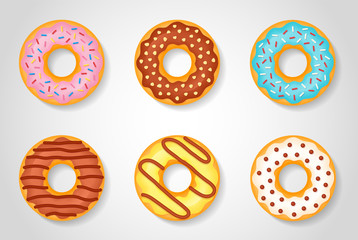 Fototapeta premium Set of sweet glazed donuts isolated on white background. Vector illustration.